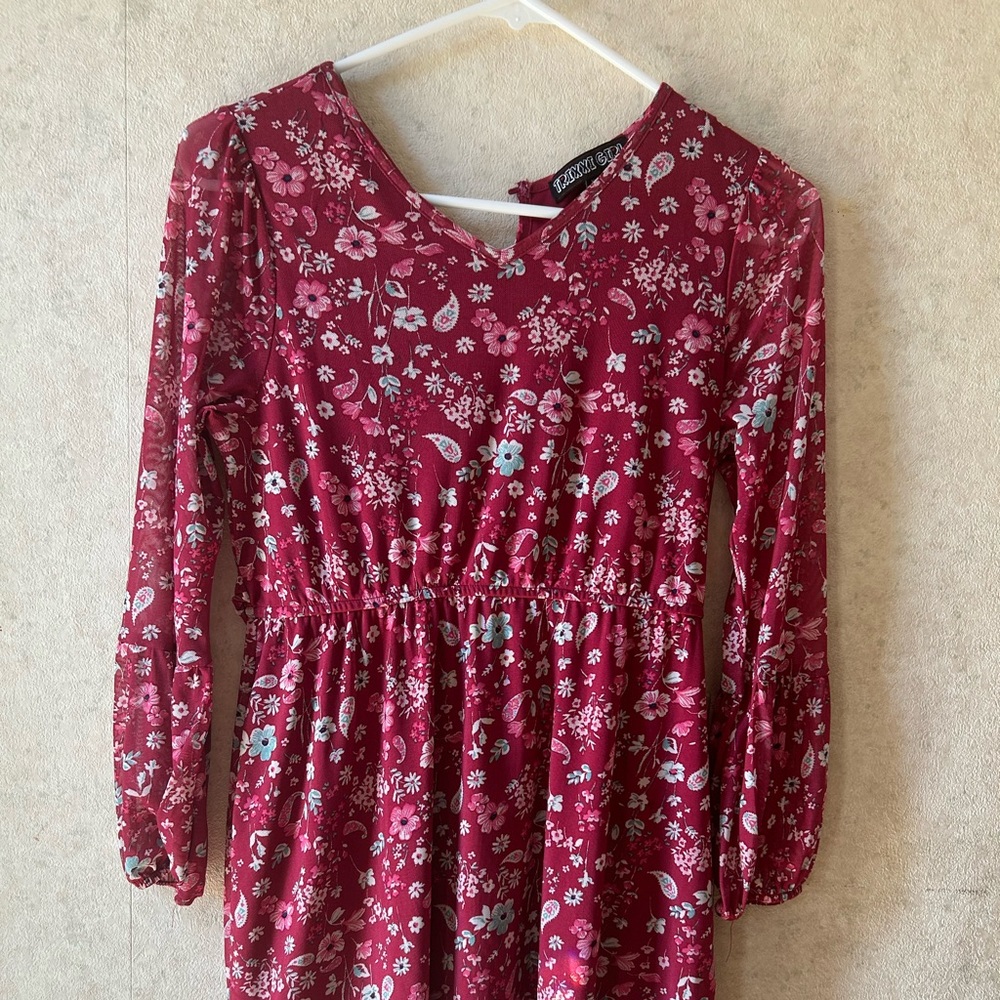 TrixxiGirl dress for kids . Size XL fits like a size 18 Plus in girls